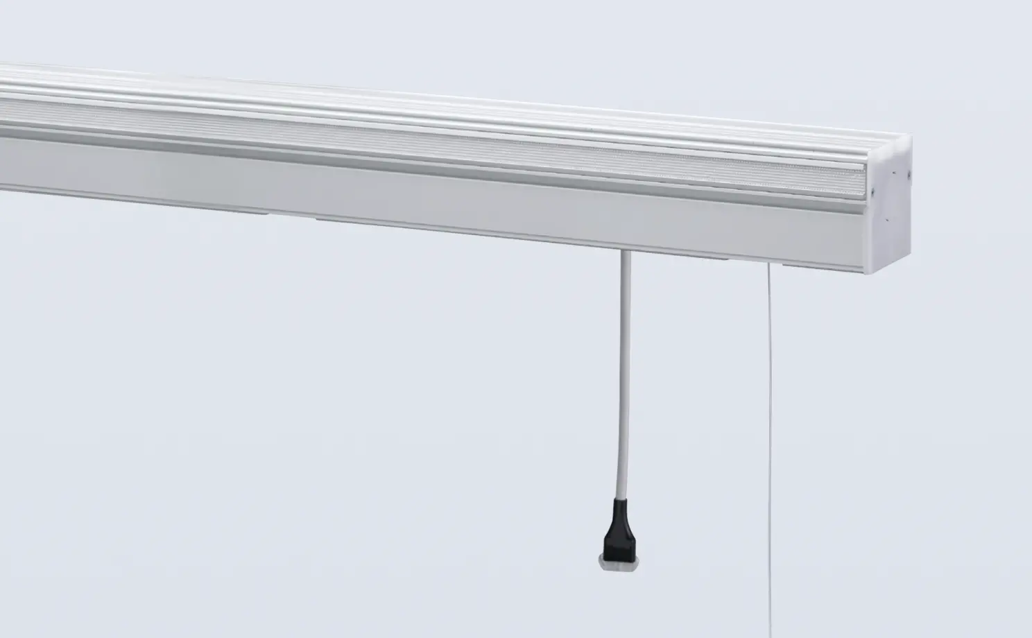 The compact design fits neatly into a small curtain box.